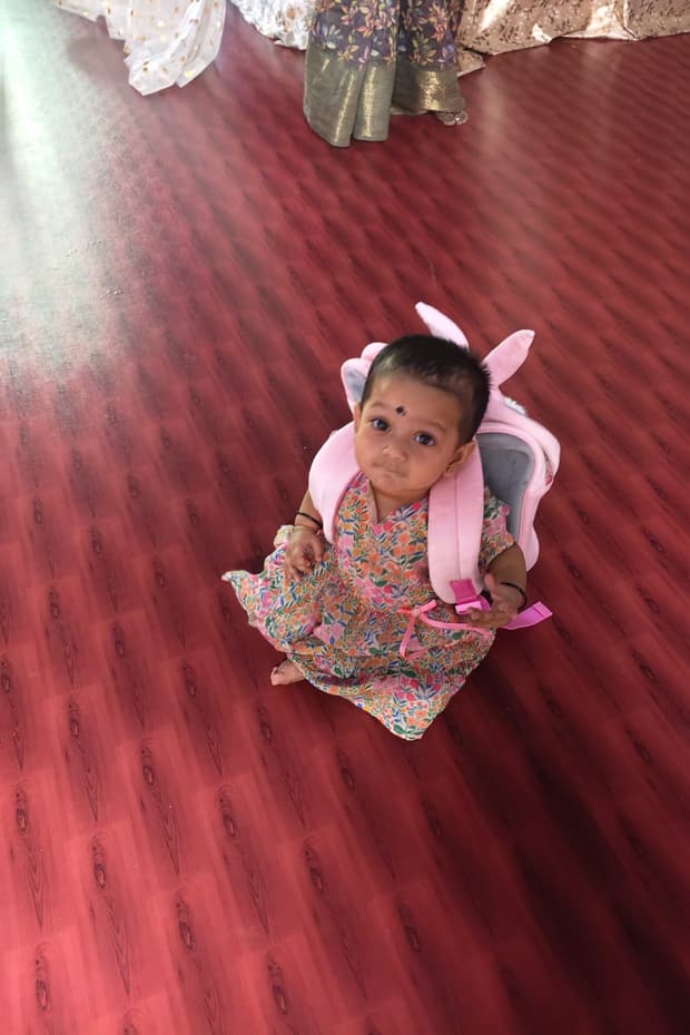 Toddler with a bunny bag exploring the learning space