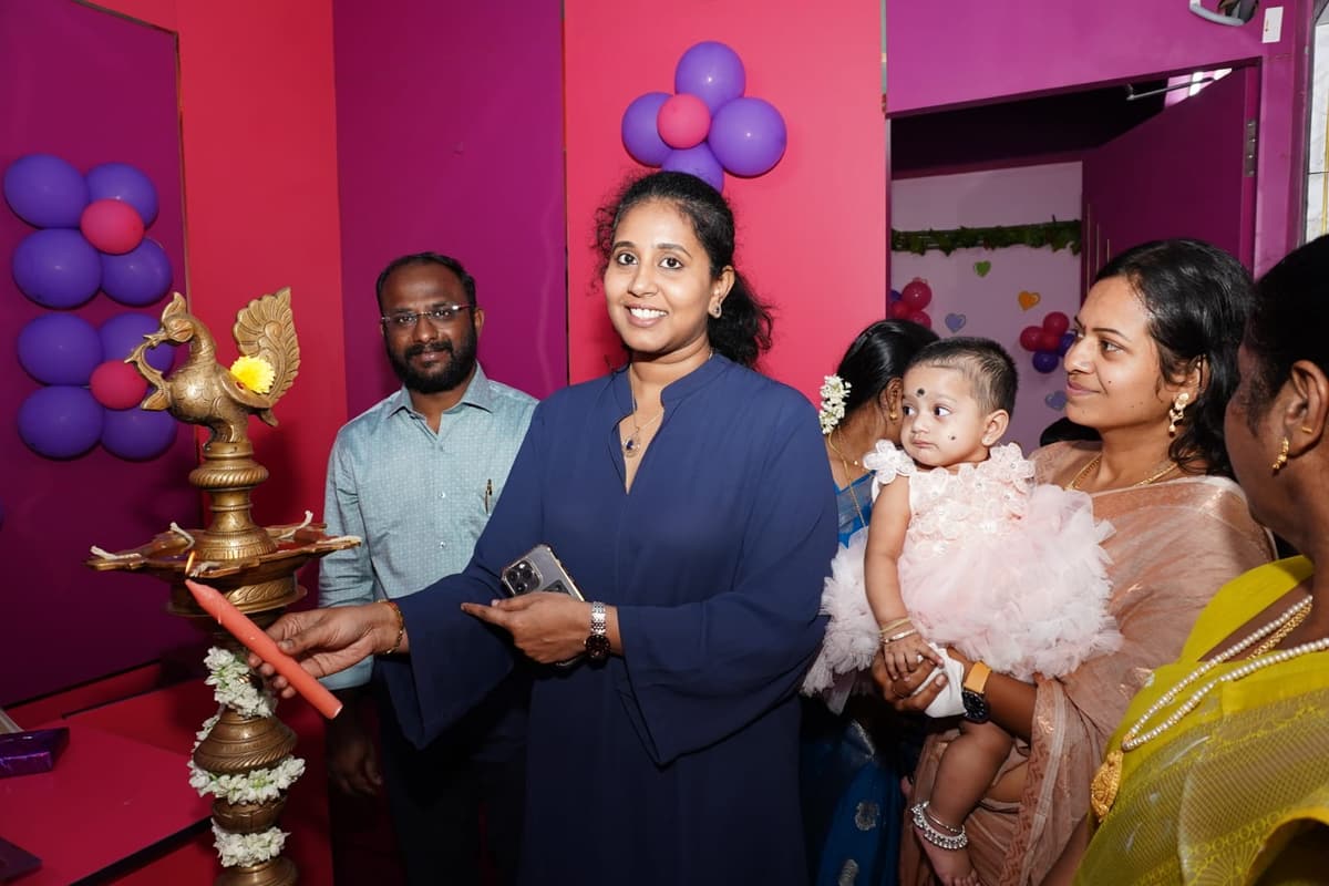 Dr. A. Agila and Dr. S. Premkumar lighting the auspicious traditional lamp at Tiny Cradle